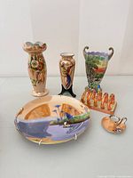 Front view of all six Noritake pieces