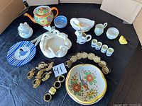 Group shot showing all ceramic and metal pieces