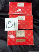 Three red patterned House of Nisbet boxes showing model labels for Winston Churchill P/796, Ronald Reagan P/736, Teddy Roosevelt P/1042 N 816