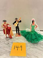 All three figurines standing