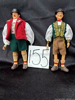 Front view of both dolls standing