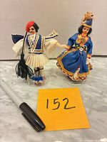 Both dolls with scale reference