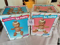 Three Tu Nene boxed dolls, lot number visible