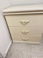 Nightstand front view with closed drawers