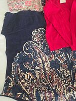 All three Chaps tops laid flat showing patterns and colors