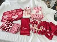 Assortment of placemats, towels and napkins laid out