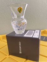 Vase on Waterford box showing sticker, cut pattern and scale