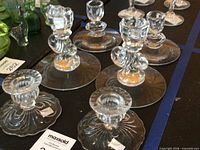 Overview showing two design styles of the candleholders on table