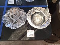 Both ABP cut glass pieces side by side