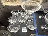 Overall view of compote and six bowls inside lot boundary