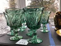 Front and side view of multiple green Jamestown goblets