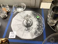 Top view of octagonal etched uranium glass serving tray and loop-handle bowl