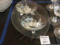 Top view of platter and two candleholders on display table