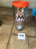 Full view of Tervis tumbler showing Miami Marlins logo and MaxSold lot tag