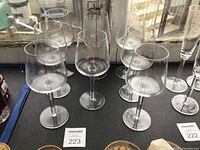Front view of eight Michael Graves wine glasses