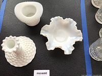 Top view of hobnail candlestick, ruffled bowl and hat-shaped holder