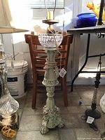 Full view of tall neoclassical lamp showing glass font, wiring and overall structure