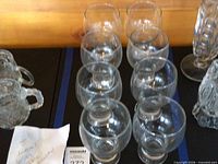 Front view of all six stacking beer glasses aligned