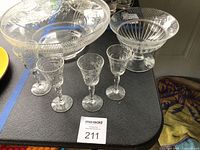 Large serving bowl, pedestal bowl, four cordial glasses grouped