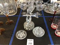 Full view of seagull flower frog flanked by two disk frogs