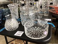 Overall view of the five Waterford crystal pieces on display table