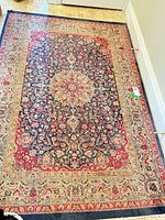 Full view of rug showing overall pattern and wear