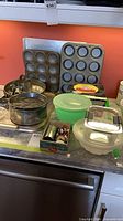 Group shot of bakeware and tools on counter