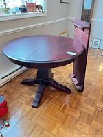 Full view of table with leaf standing separately