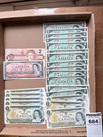 Overview of all banknotes in box showing counts and types