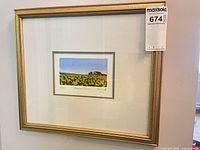Framed print showing full artwork, mat and frame