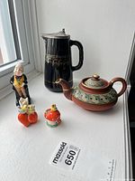 Group shot of all five items on windowsill