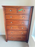 Front view showing all seven drawers and handles