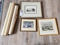 Group shot of three framed prints and three rolled/loose prints