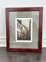 Front view of framed etching under glass