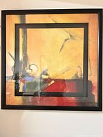 Full view of square framed abstract print showing colours and double mat