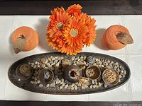 Full view of all decorative items on white surface