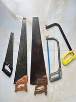 Five saws laid out for overview