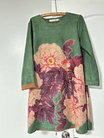 Full view of front of dress hanging on door