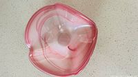Top view of pink and white swirl freeform glass bowl