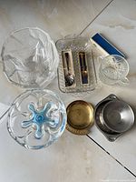 group shot of all glass, metal dishes, and boxed spoons