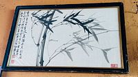 framed horizontal view showing entire bamboo ink painting, calligraphy, seals, frame wear