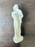 Full front view of Royal Doulton porcelain couple figurine