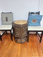 Side table between two chairs showing overall lot