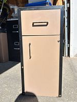 Front view of two-compartment wood cabinet