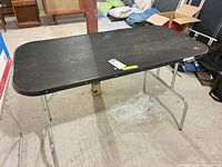 Full view of grooming table top and metal legs