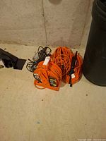 Group of cords on reel, loose cords, trouble light
