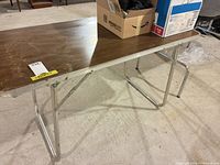 Full view of folding table with legs extended