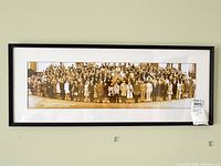 Full view of framed panoramic Harvard University group photograph on wall