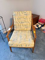 Front view of chair showing cushions and armrests