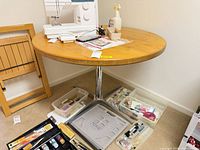 Full view of tabletop with chrome pedestal base visible